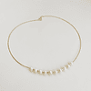 Collar dorado con perlas naturales