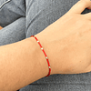 Pulsera roja y mostacillas de plata