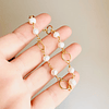 Pulsera dorada y perlas naturales