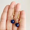 Aros dorados colgantes con Lapislazuli