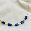 Collar dorado con tubos de Lapislázuli