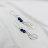 Aros largos con hojas de plata y piedra Lapislázuli