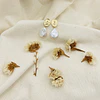 Aros dorados con gotas de perla