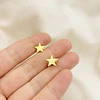 Aros estrella dorados