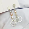 Aros largos de plata y perlas