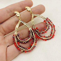 Aros gotas doradas con cristales rojos