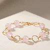 Pulsera argollas doradas con Cuarzo Rosado
