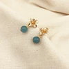 Aros flor dorada mini con piedra Amazonita