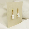 Aros dorados con perlas naturales