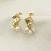 Aros dorados con racimo de perlas