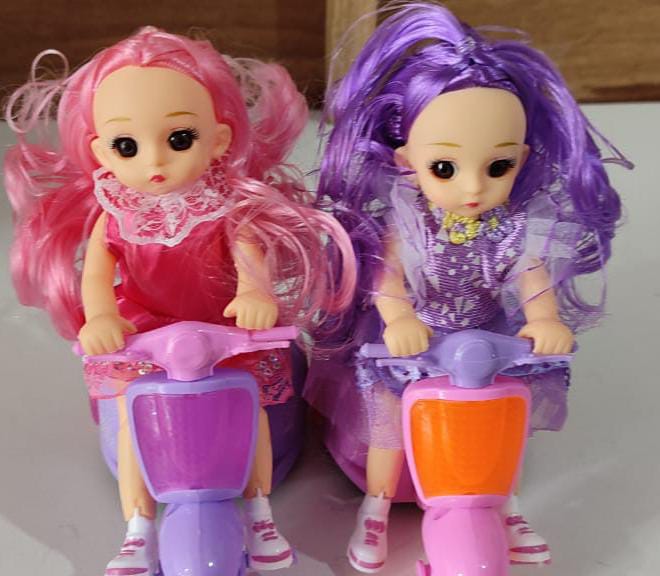 MUÑECA EN MOTONETA SCOOTER CON SONIDO Y LUZ LED MOD#3172