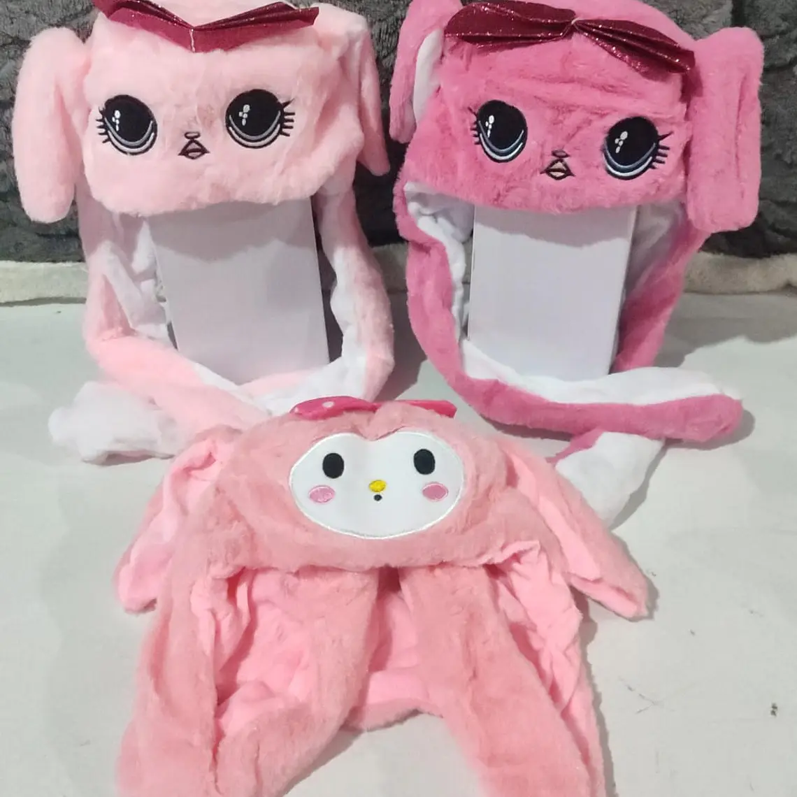 GORRO DE PELUCHE CON  OREJITAS MOVIBLES Y LUZ LED MOD#6601 (LOS TONOS Y EL DISEÑO PUEDEN VARIAR) 25