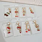 PAQ DE 4 LLAVEROS DE ORO LAMINADO DISEÑOS CEREZAS Y FRESAS🍒🍓 - Miniatura 2