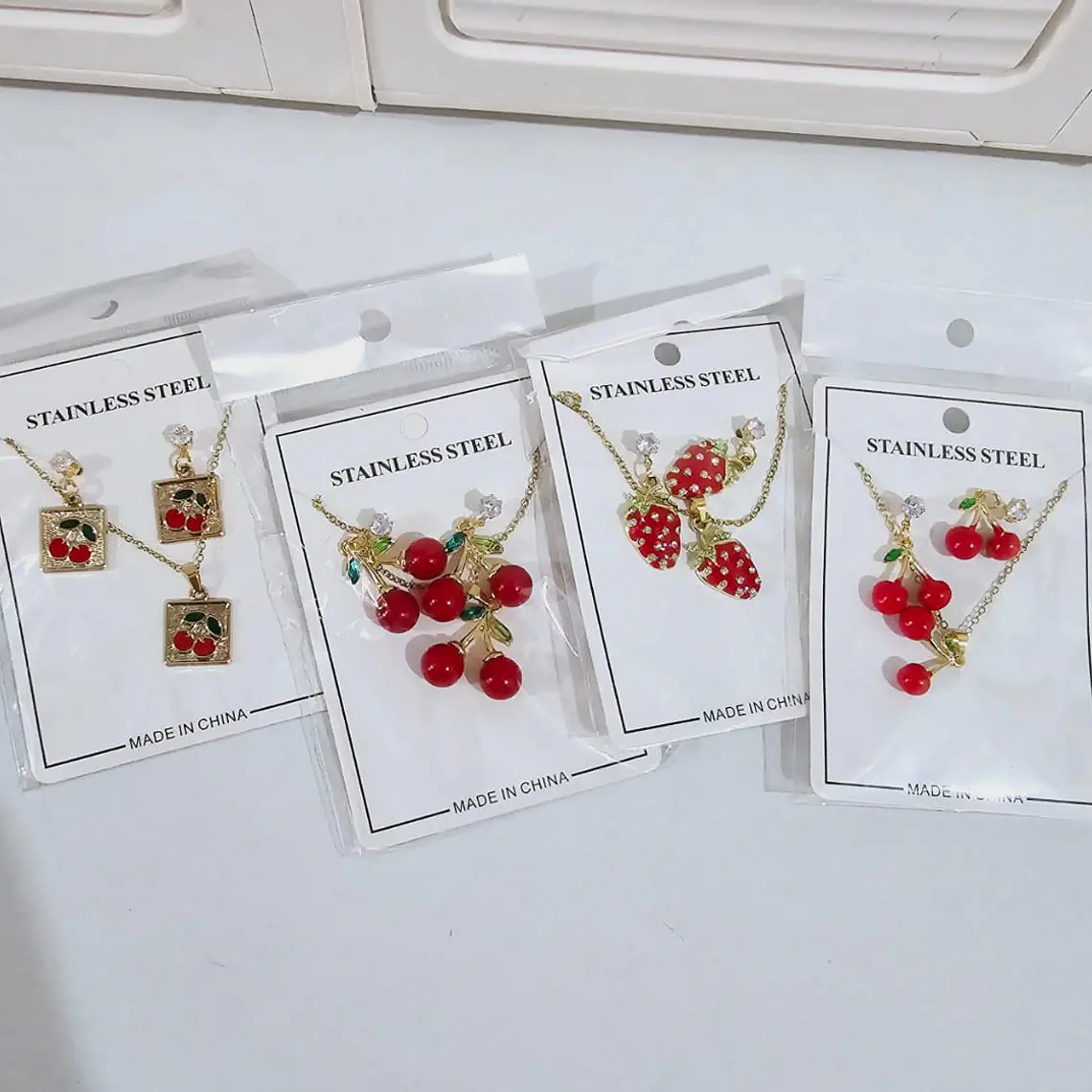 JUEGO DE CADENA CON ARETES🍓 1