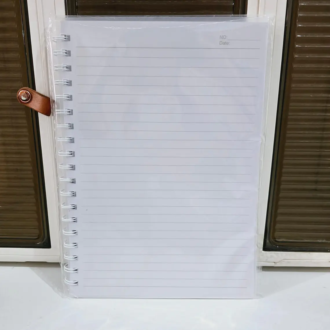 LIBRETA MEDIANA RAYAS PASTA TRANSPARENTE CON 100 HOJAS  MOD#TK-0122BJ 2