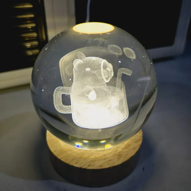 8CM ESFERA DE CRISTAL DISEÑO  CAPIBARA CON LUZ LED CALIDA MOD# SJQ8-16 6