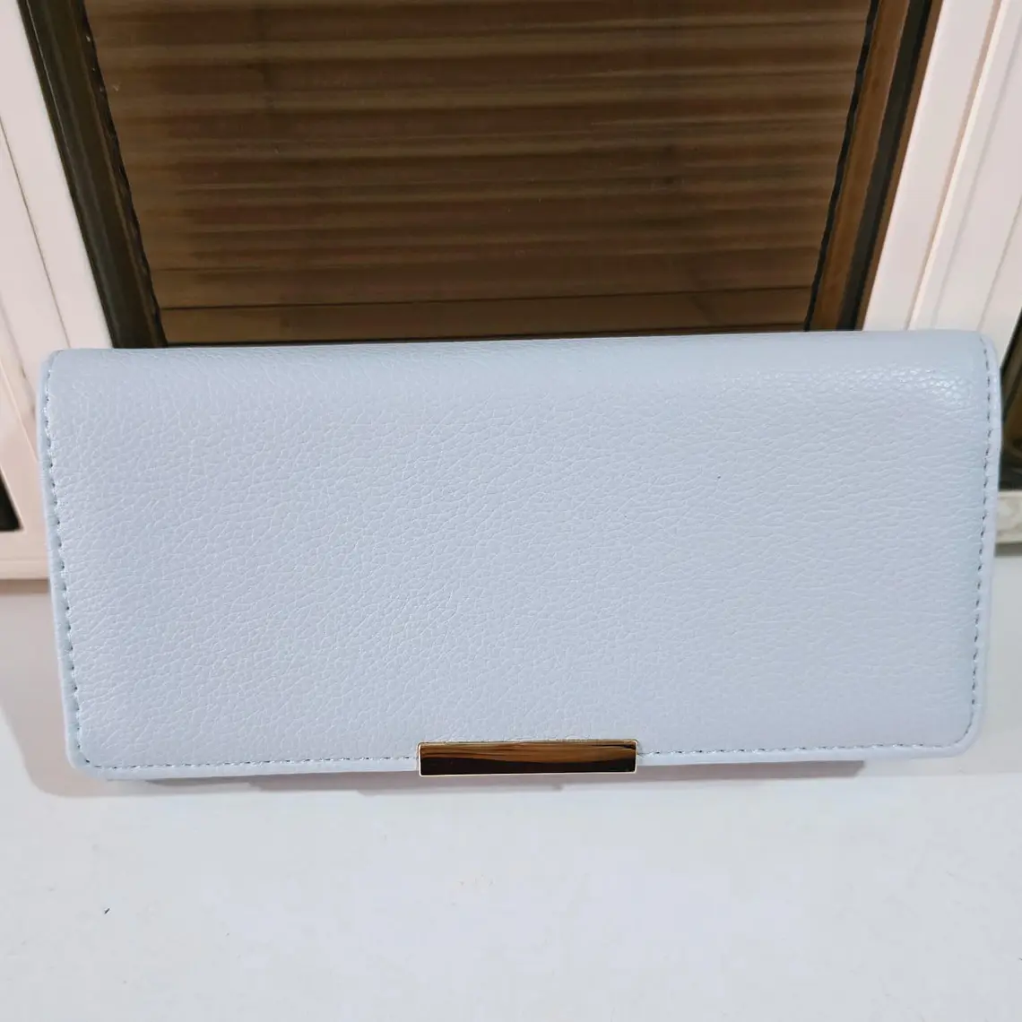 CARTERA/MONEDERO MOD# SM-15-244 Y 45 7