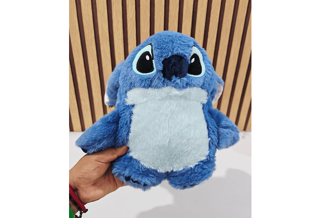 PELUCHE STITCH CON BOLSA PARA AGUA CALIENTE PARA ALIVIAR DOLORES Y MOLESTIAS