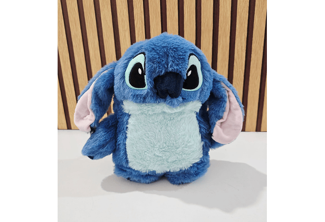 PELUCHE STITCH CON BOLSA PARA AGUA CALIENTE PARA ALIVIAR DOLORES Y MOLESTIAS
