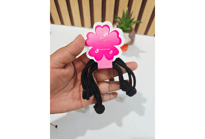 BOLSA CON 12 PARES DE LIGAS CON NUDO "DILA" PARA EL CABELLO MOD# ET/60