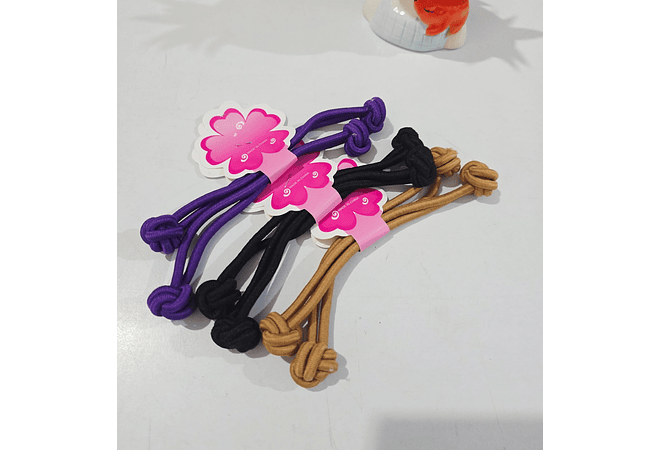 BOLSA CON 12 PARES DE LIGAS CON NUDO "DILA" PARA EL CABELLO MOD# ET/60