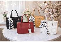 BOLSITA MARICONERA CON LAZO ESTAMPADO MOD #2065-7