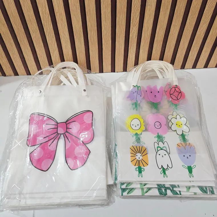 DOCENA DE BOLSITAS TRANSPARENTE MOÑO O FLORES PARA REGALO 🌷🎁 1