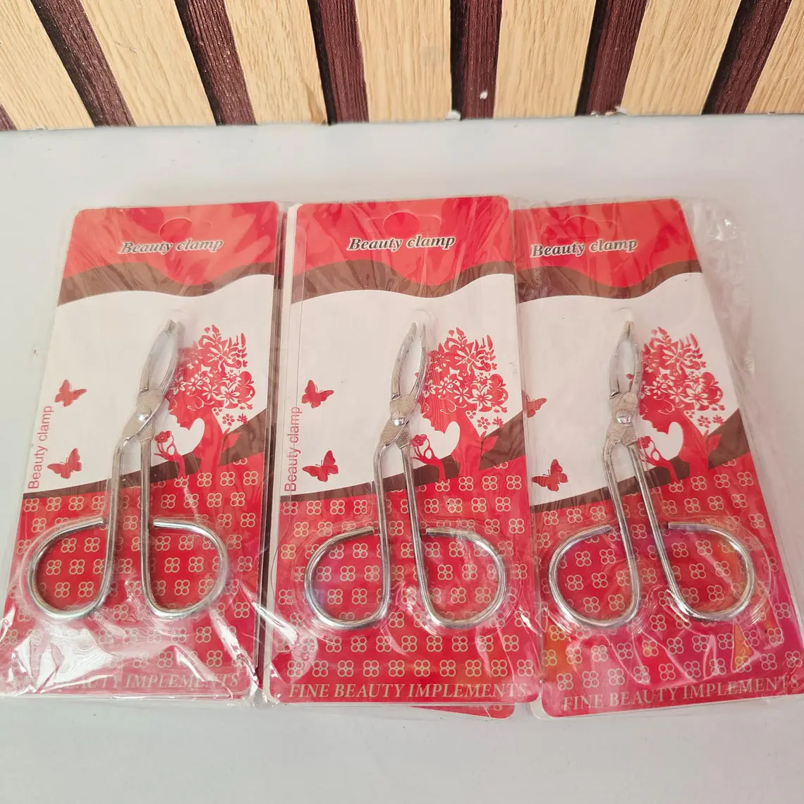 DOCENA DE PINZAS PARA DEPILAR MOD# TZ-1 1