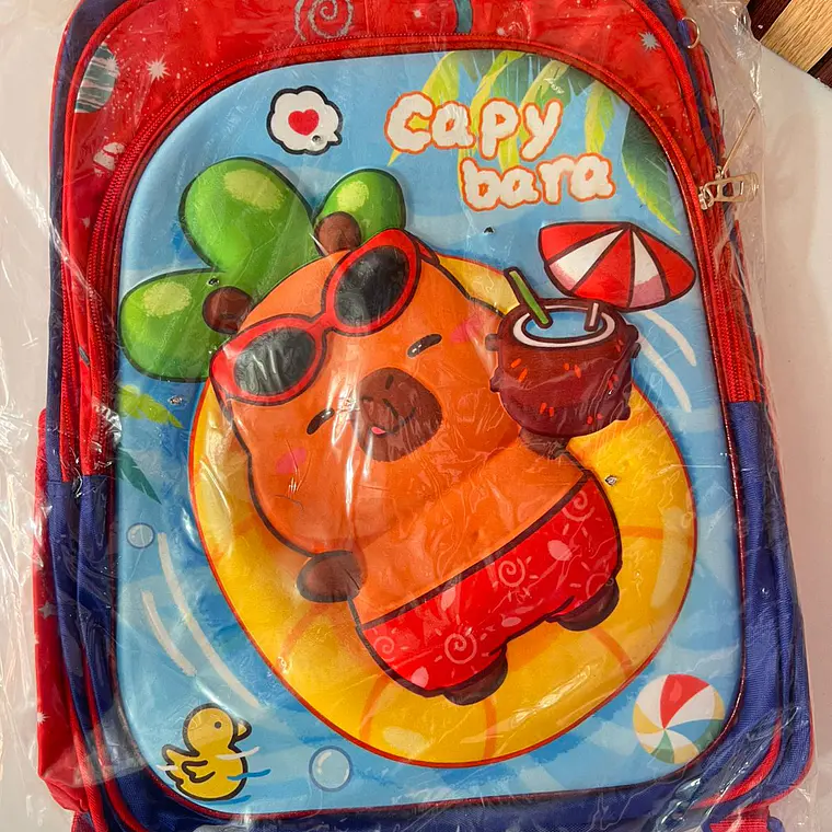 COMBO MOCHILA PARA PRIMARIA DISEÑO CAPIBARA AL AZAR MOD# 25163-7 7
