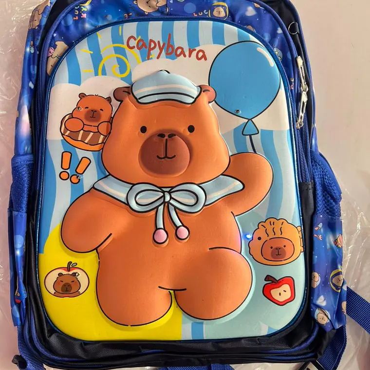 COMBO MOCHILA PARA PRIMARIA DISEÑO CAPIBARA AL AZAR MOD# 25163-7 14
