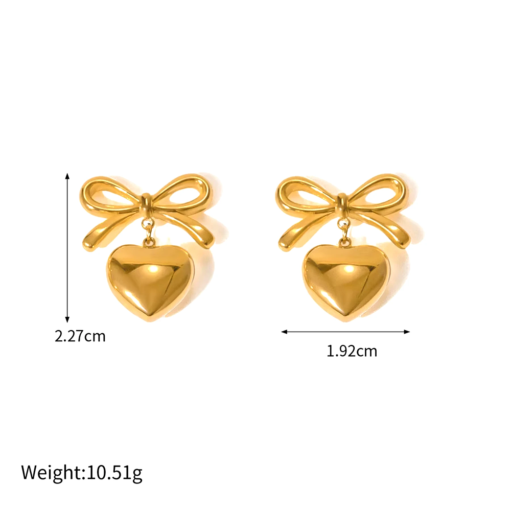 Aretes en forma de moño con corazón