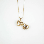 Relicario corazón dorado con incrustaciones