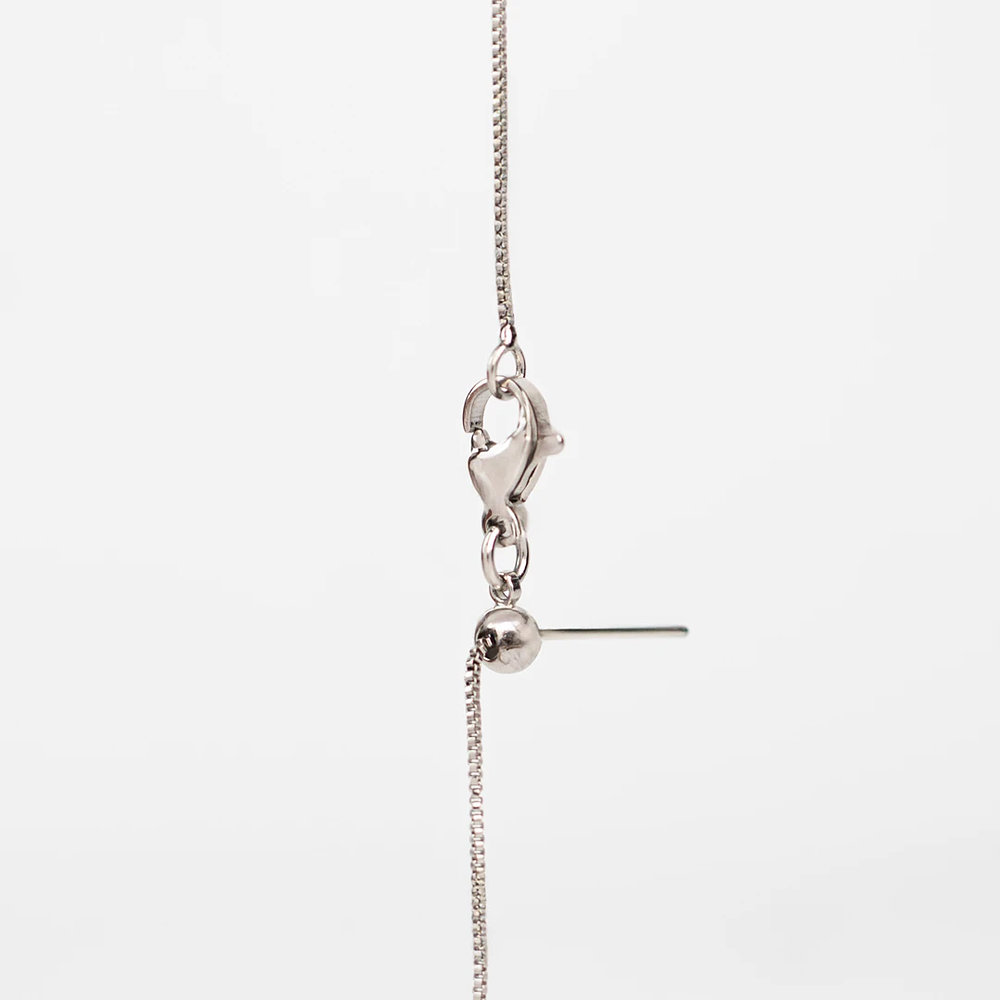 Relicario corazón plateado con incrustaciones