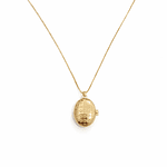 Relicario ovalado diseño de caracola rosa