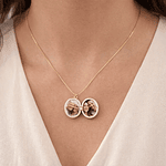 Relicario ovalado diseño de caracola rosa