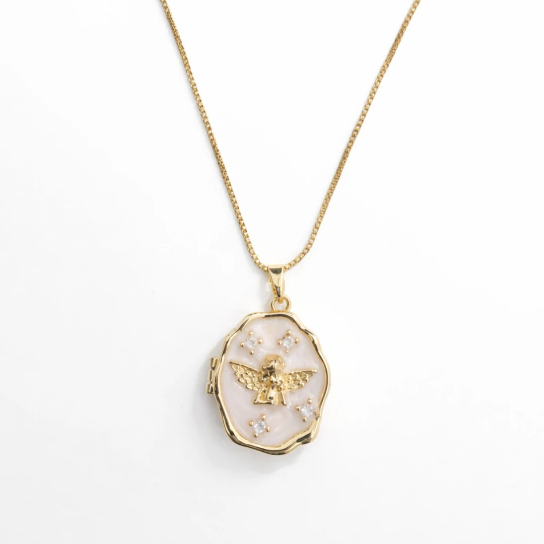 Relicario ovalado irregular diseño Ángel dorado 