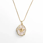 Relicario ovalado irregular diseño Ángel dorado 