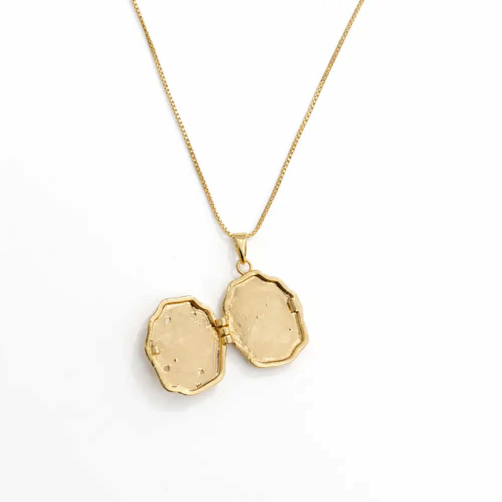 Relicario ovalado irregular diseño Ángel dorado 