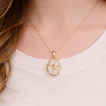 Relicario ovalado irregular diseño Ángel dorado 