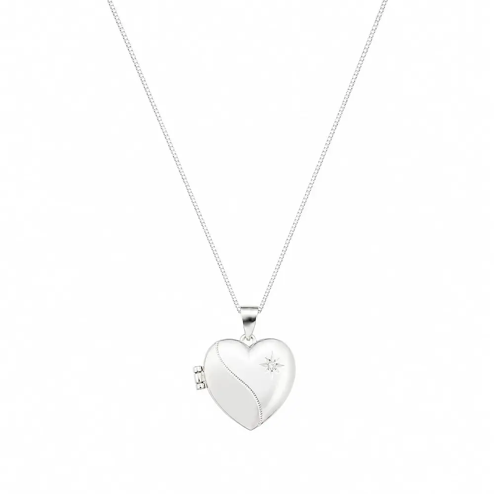 Relicario corazón con diseño de estrella Plata S925