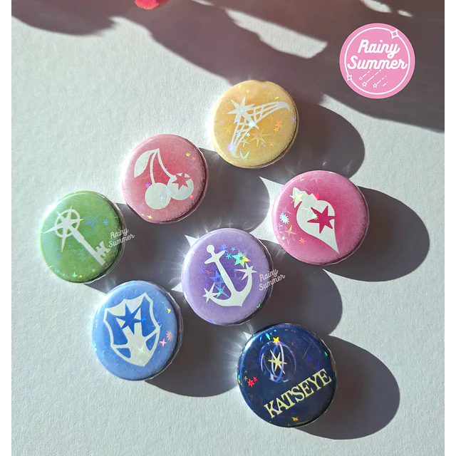 KATSEYE - PINS/CHAPITAS HOLO SÍMBOLOS & COLORES