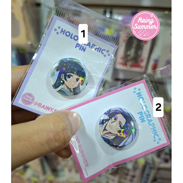 LOS DIARIOS DE LA BOTICARIA - CHAPITAS / PINS HOLOGRÁFICOS