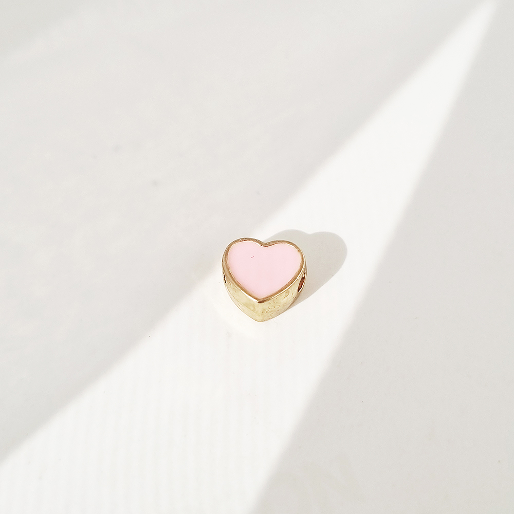 dije corazon solitaire rosa