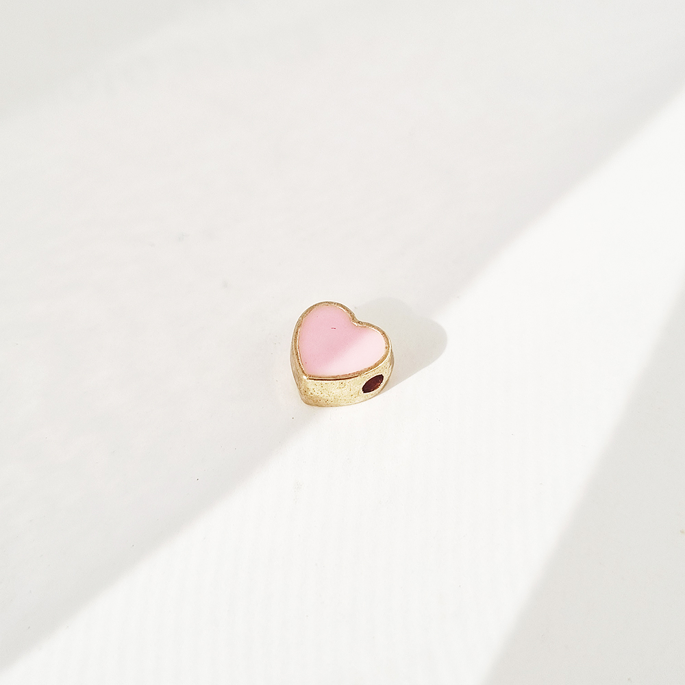 dije corazon solitaire rosa