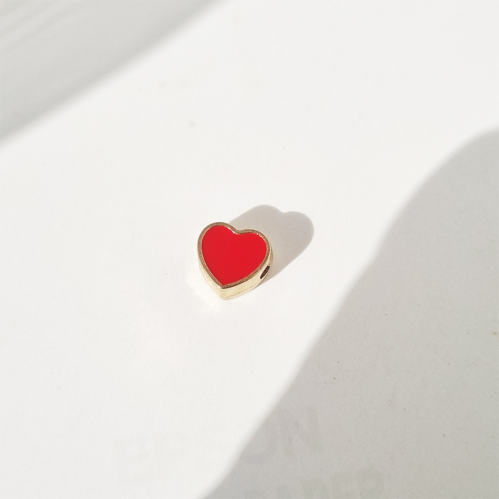 dije corazon solitaire rojo