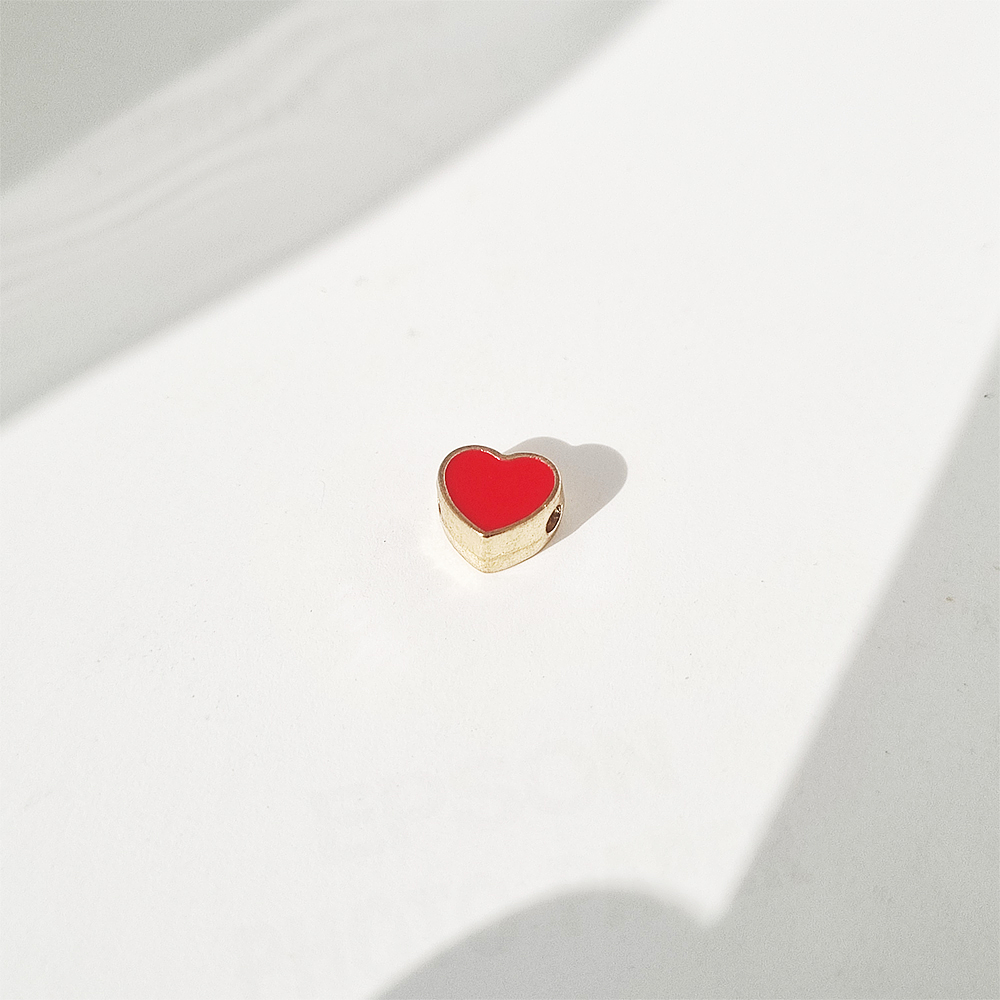 dije corazon solitaire rojo