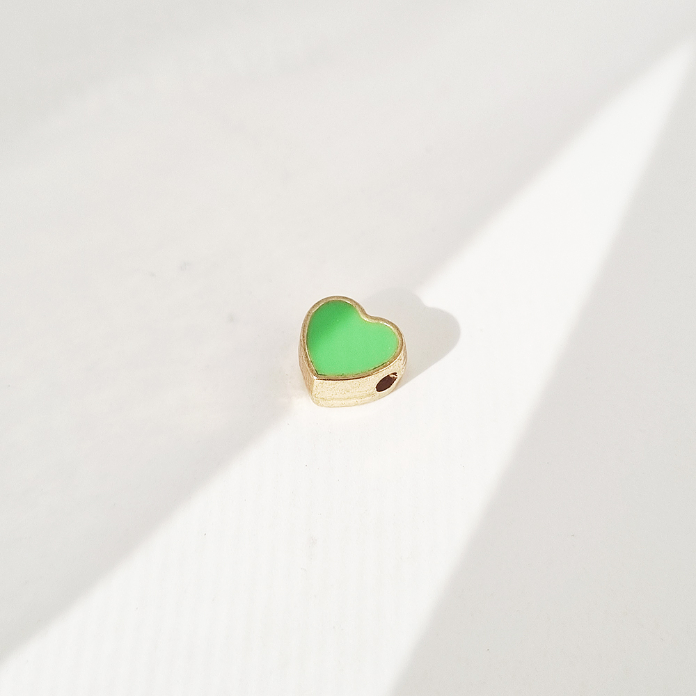 dije corazon solitaire verde