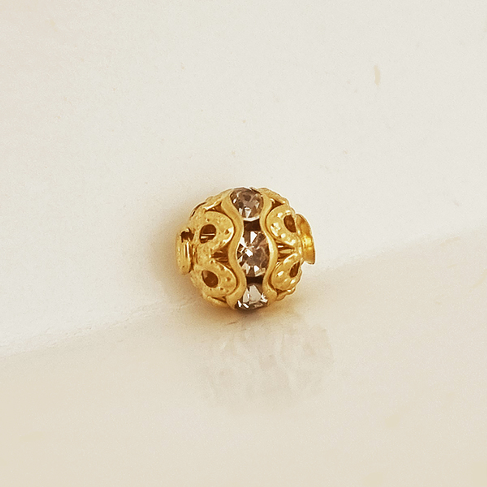 dije mini esfera dorada brillante