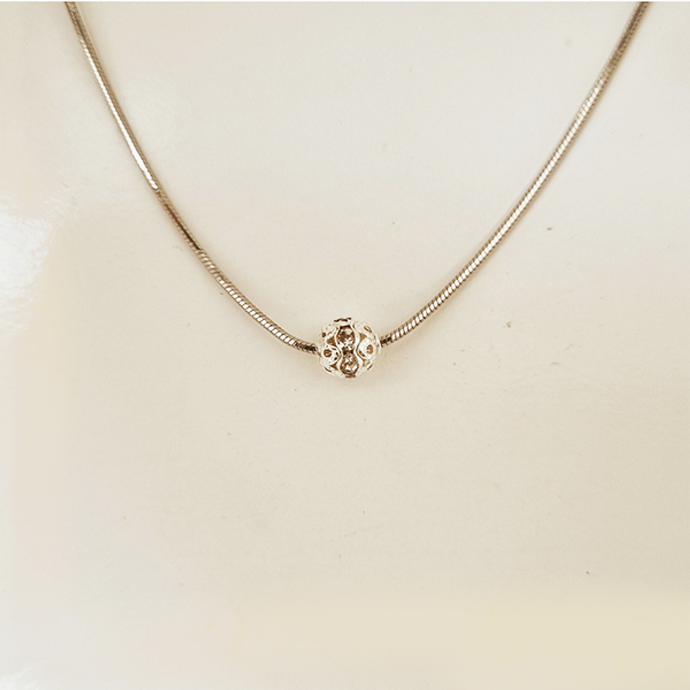 dije mini esfera plateada brillante