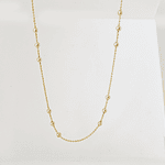 collar bolitas doradas